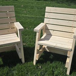 Pair of new wooden lawn chairs