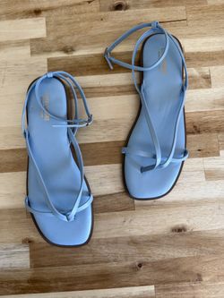 Cushion air sandals does have a scratch on the inside. They are size 7 1/2.