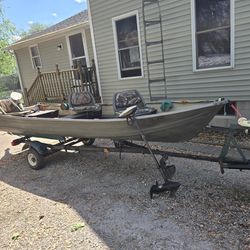 $850.     *update* 14 Ft John Boat With 6hp Engine.