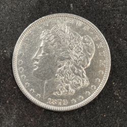 1879 Silver A/U Morgan Dollar In A Slightly Circulated Condition 271