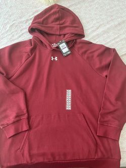 Under Armour men's red pullover hoodie with a soft, comfortable feel. Features a front kangaroo pocket and classic UA logo for a sporty look. Lightwei