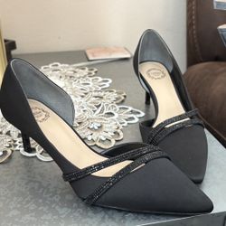 brand new, never worn black heels with jewel detailing. size 8