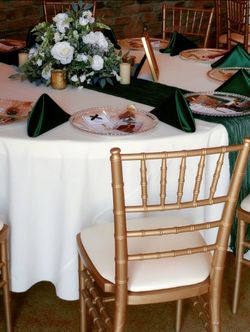 Gold Chiavari Chairs and leather cushions