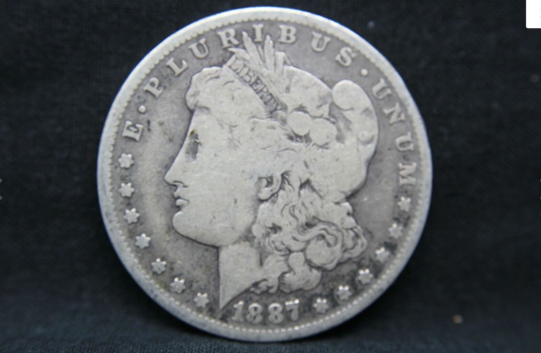 1887 O 90% Silver Morgan Dollar (57)