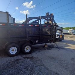 HEAVY-DUTY GRAPPLE UNIT ON LOAD TRAIL