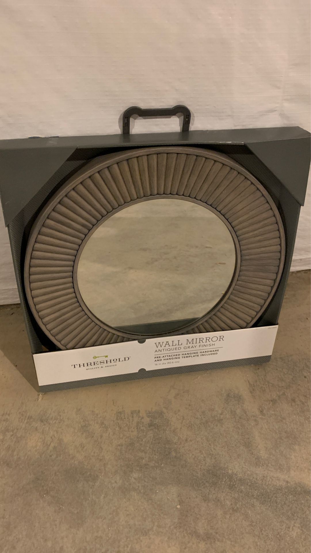 Wall mirror (16 in diameter)