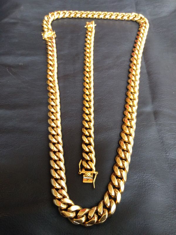 $140...14mm 18 karat gold plated Cuban link chain and bracelet will not ...