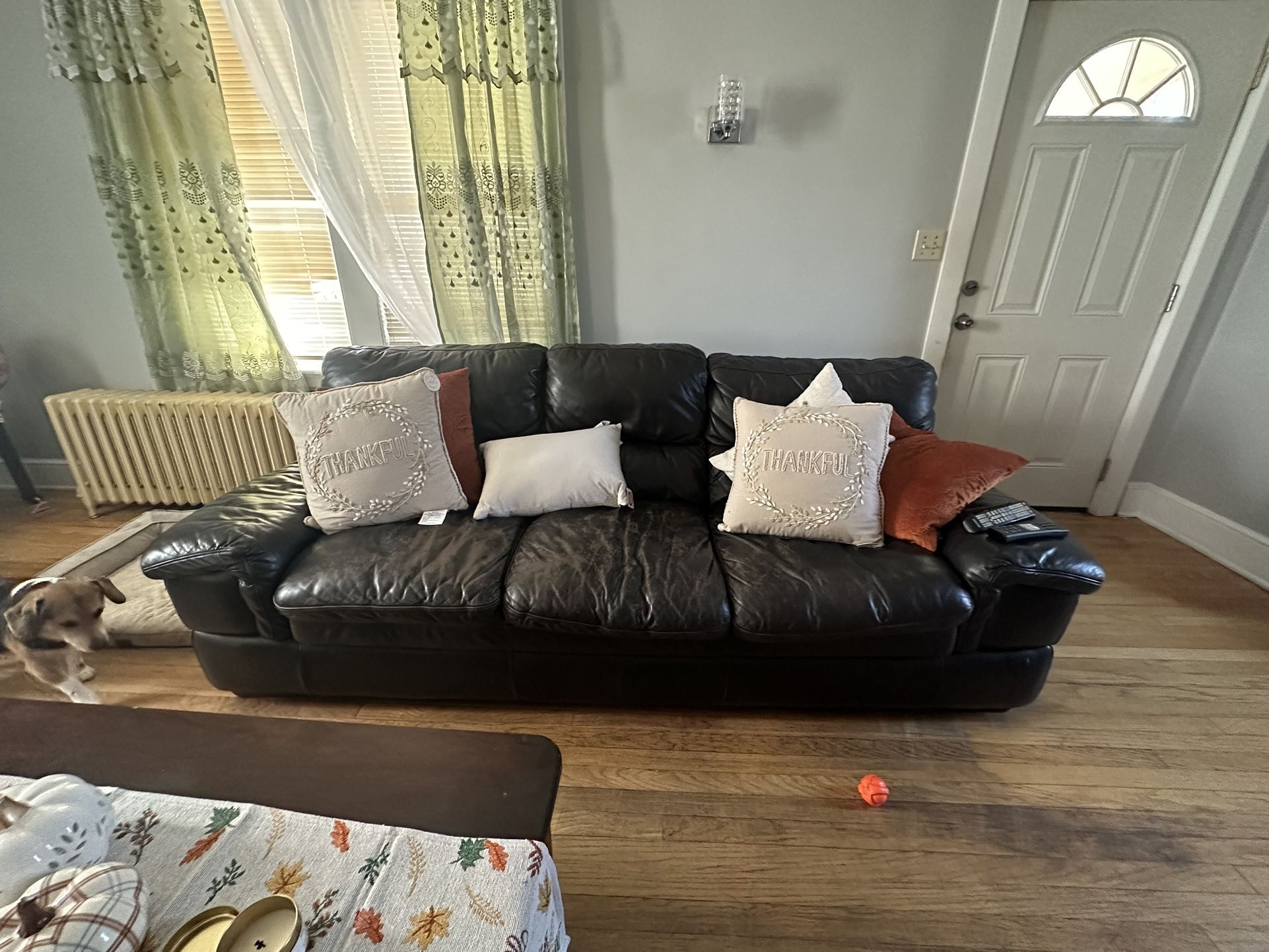 2 couches and two lamp tables for sale.