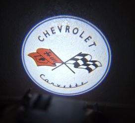 2 Corvette UNIVERSAL WIRELESS LOGO LED PUDDLE DOOR PROJECTOR LIGHTS see all choices sold separately. AAA BATTERIES NOT INCLUDED.  SHIPPING AVAILABLE