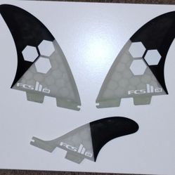 FCS II 2 Al Merrick Twin + Stabiliser / Trailer surfboard fins