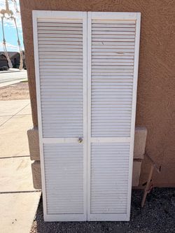 White Wood Bi-Fold Plantation Shutter Style Closet Door - 35.62” x 79”