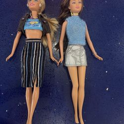 2 Barbie collection dolls and her car