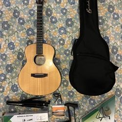 Acoustic guitar set in pristine condition
