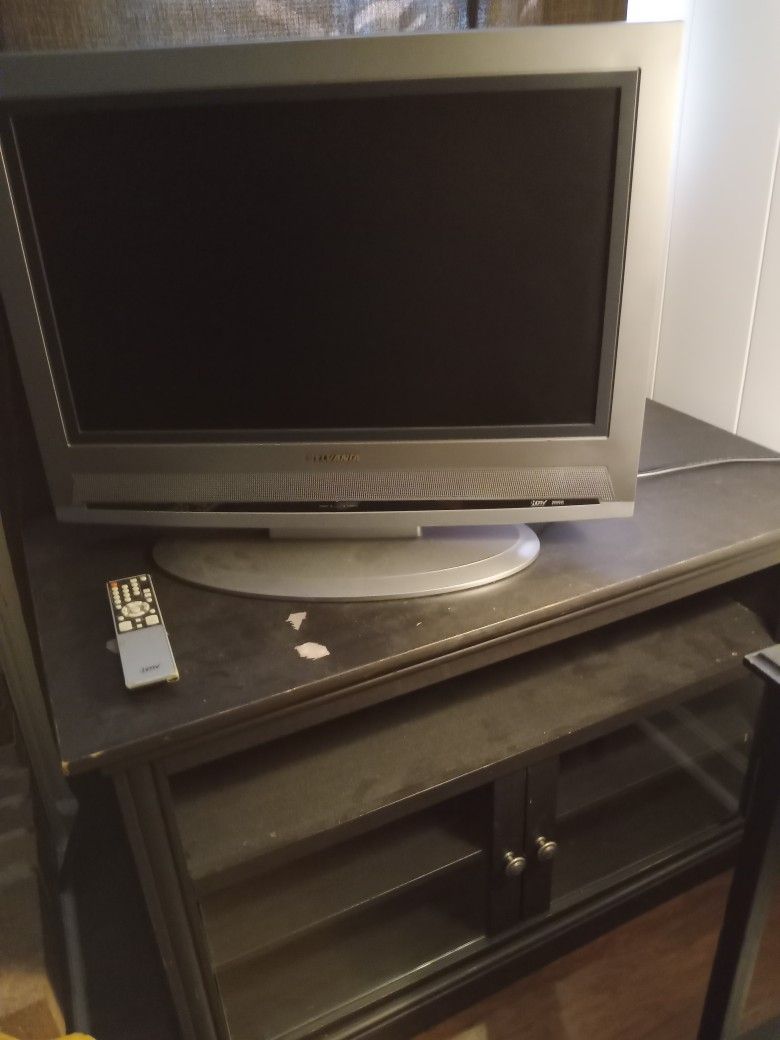 T.V Is Flat And Works Excellent And Stand BOTH $50