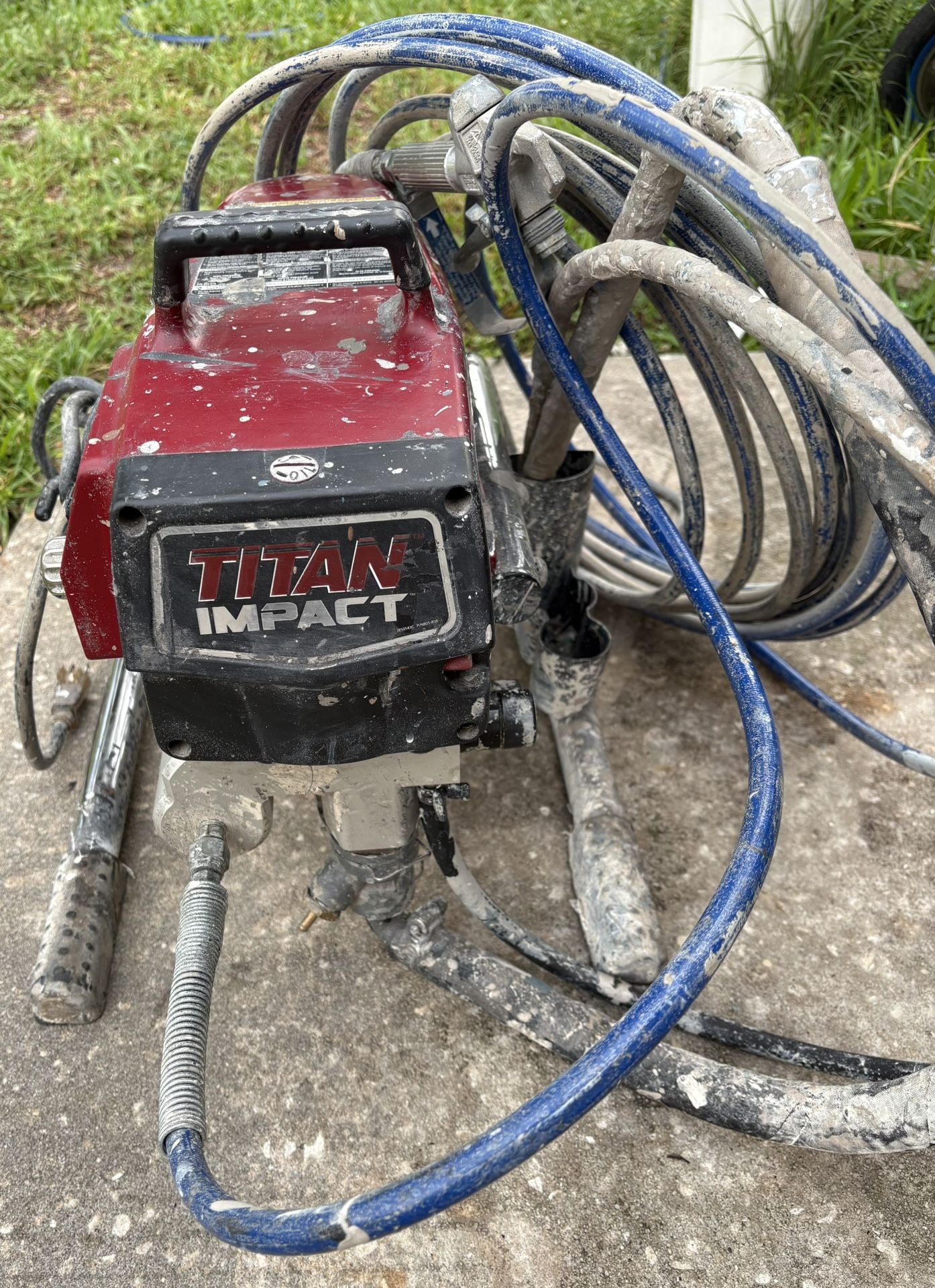 Titan Impact 440 Skid Airless Paint Sprayer With Hose And Gun