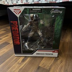 Unmasked Predator Statue