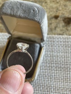 Ring with A solidary CZ in the center- The Metal Is White Gold -
