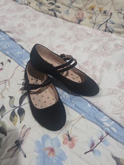 Black buckle dress shoes