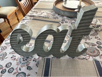 Tin “Eat” sign