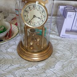 Table top antique clock.