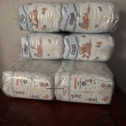 3 1/2 bags of huggies diapers size 1 + 1 pampers size 1 