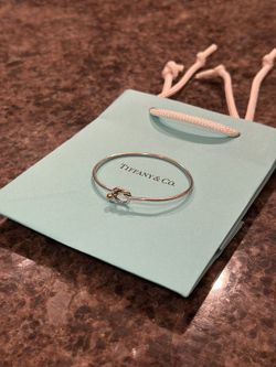 TIFFANY & CO. Vintage Love Knot Hook Bangle in 18k Yellow Gold and Sterling Silver