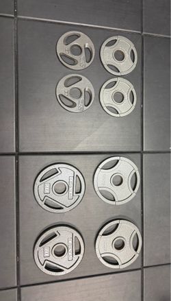 Four 10 lbs & four 5 lbs plates