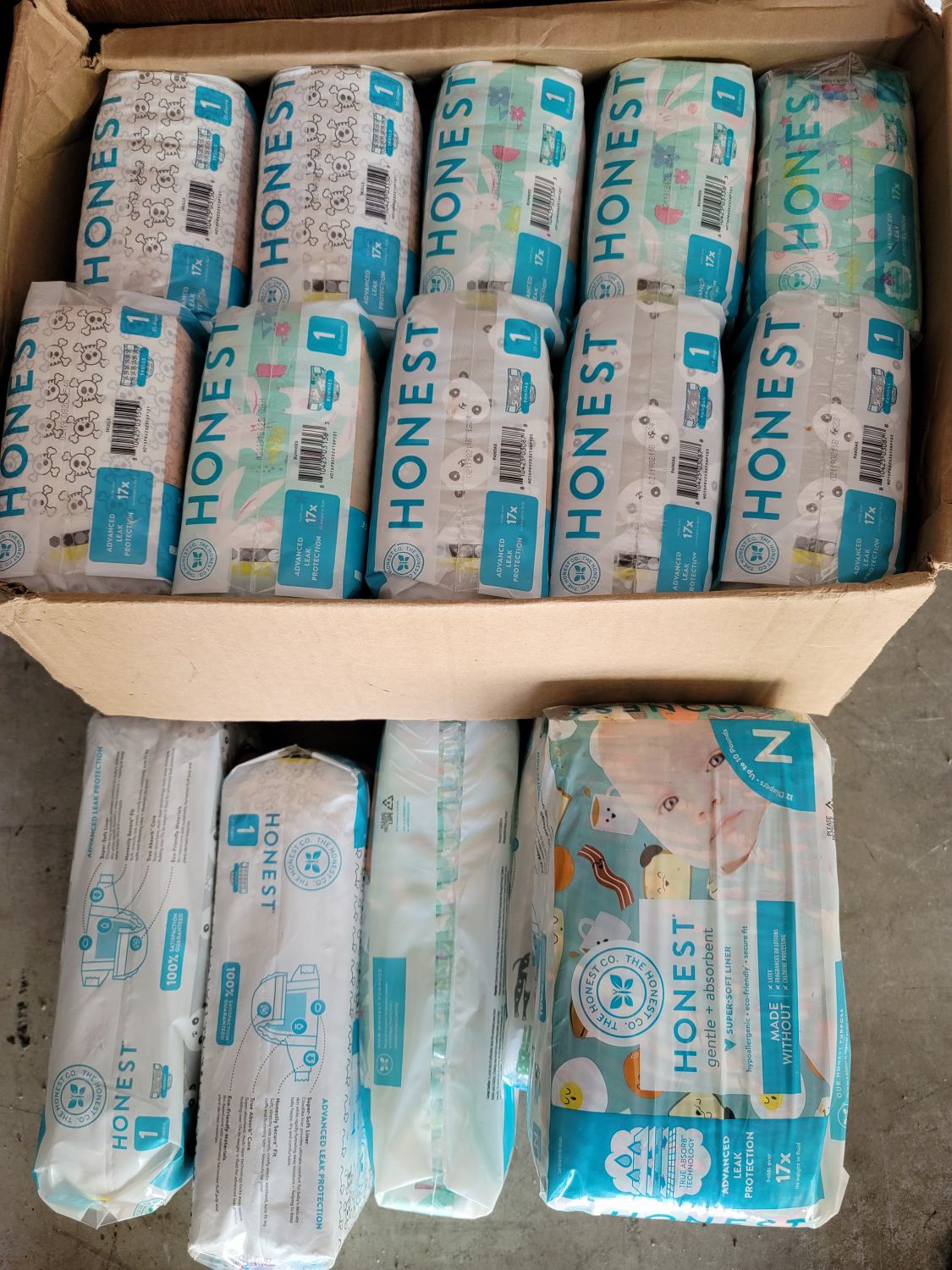Lot of 12 pack of pampers , diapers honest size 1