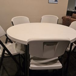 Lifetime Round Commercial Folding Table  and 5 Lifetime Folding Chairs