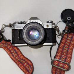 Canon AE-1 35mm Film Camera w/ Canon FD 50mm f/1.8 Lens – Vintage Classic