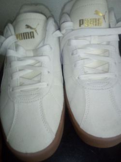 Brand new pumas lowtop size 10