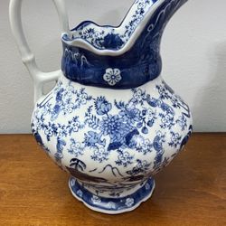 Seymour Mann Chinoiserie “China Blue" porcelain pitcher with floral and bamboo motifs.