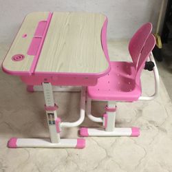 Child’s adjustable desk and chair