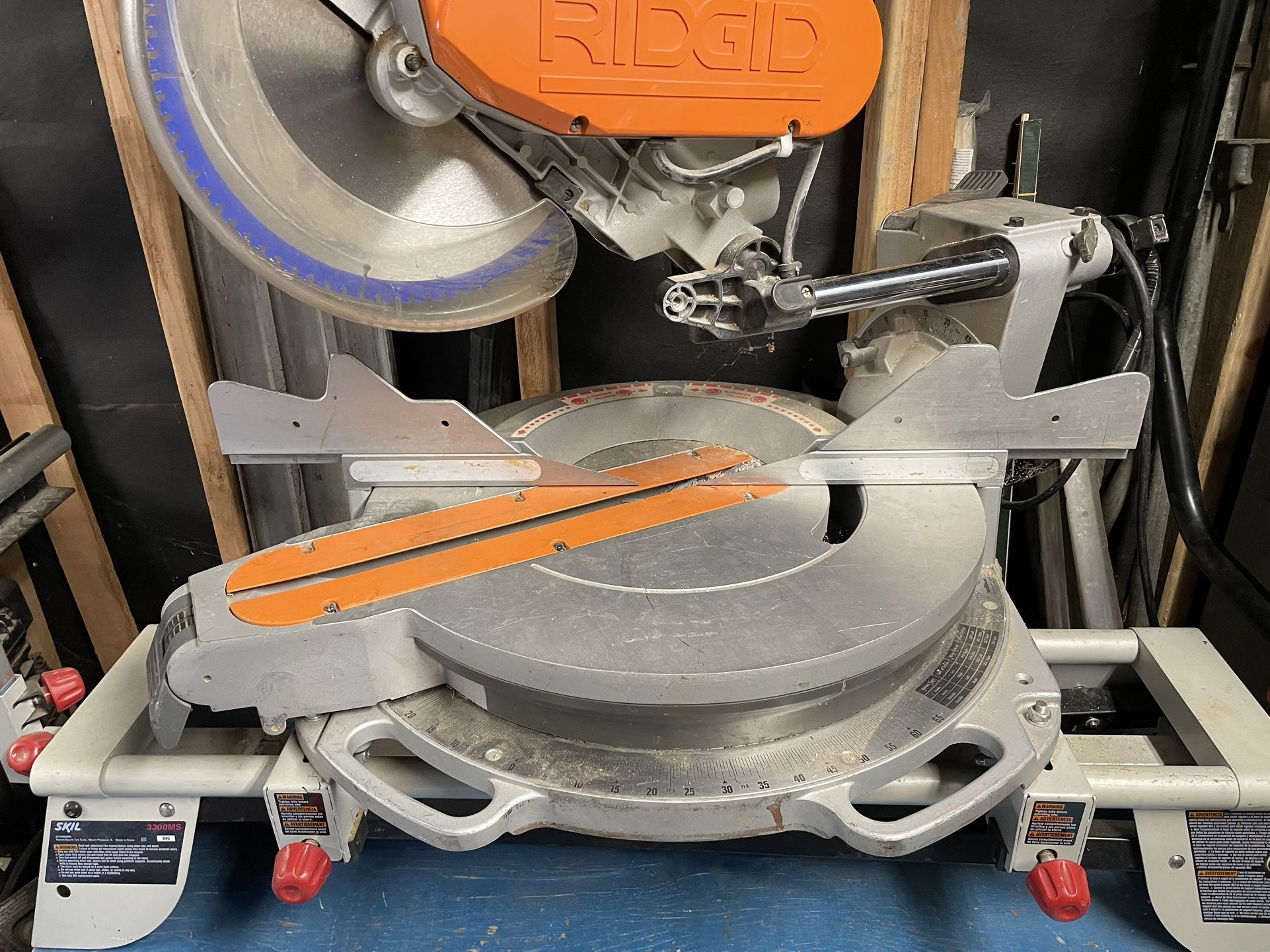 Ridgid 12” Duel Bevel Sliding Miter Saw w/stand and new 80 Tooth Fine Cut Blade