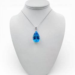 14k White Gold Pendant with 57 Ct. Blue Topaz and 18" Necklace.