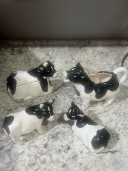 Cow set: coffee creamer , sugar bowl, salt & pepper set
