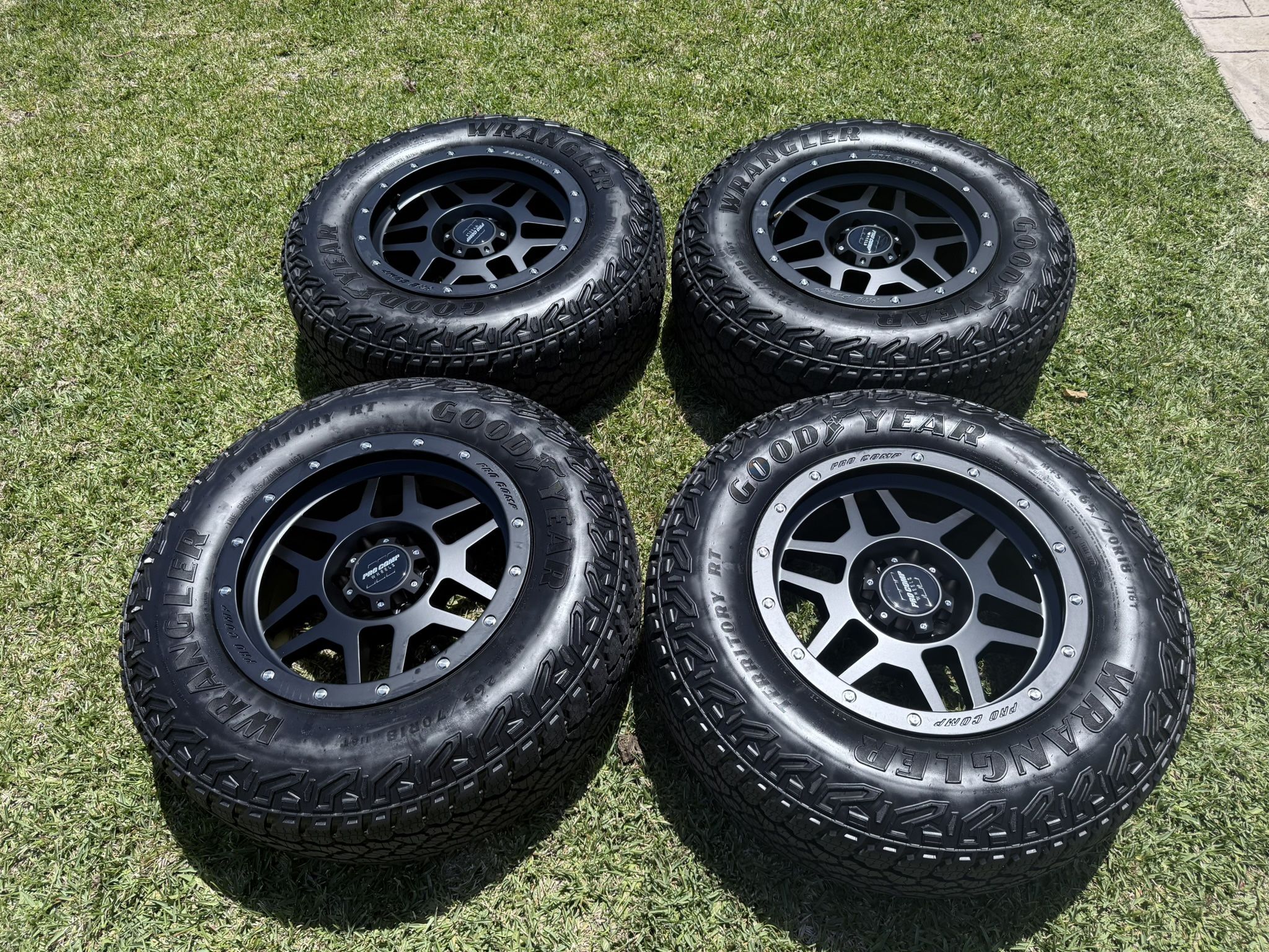 (4) 18” Pro Comp Wheels 265/70R18 Goodyear Wrangler All Terrain 