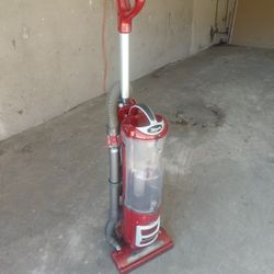 SHARK Professional Vacuum.   Works Great.  Powerful