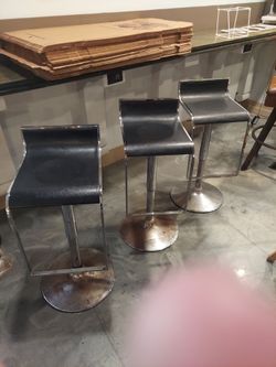 Quarter back black barstools