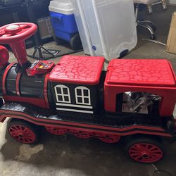 JOYLDIAS 12V 2 Seater Toy Ride on Train with Music, Train Honk, Lights, High/Low Speed and Storage, Red