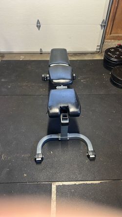 Adjustable bench press seat