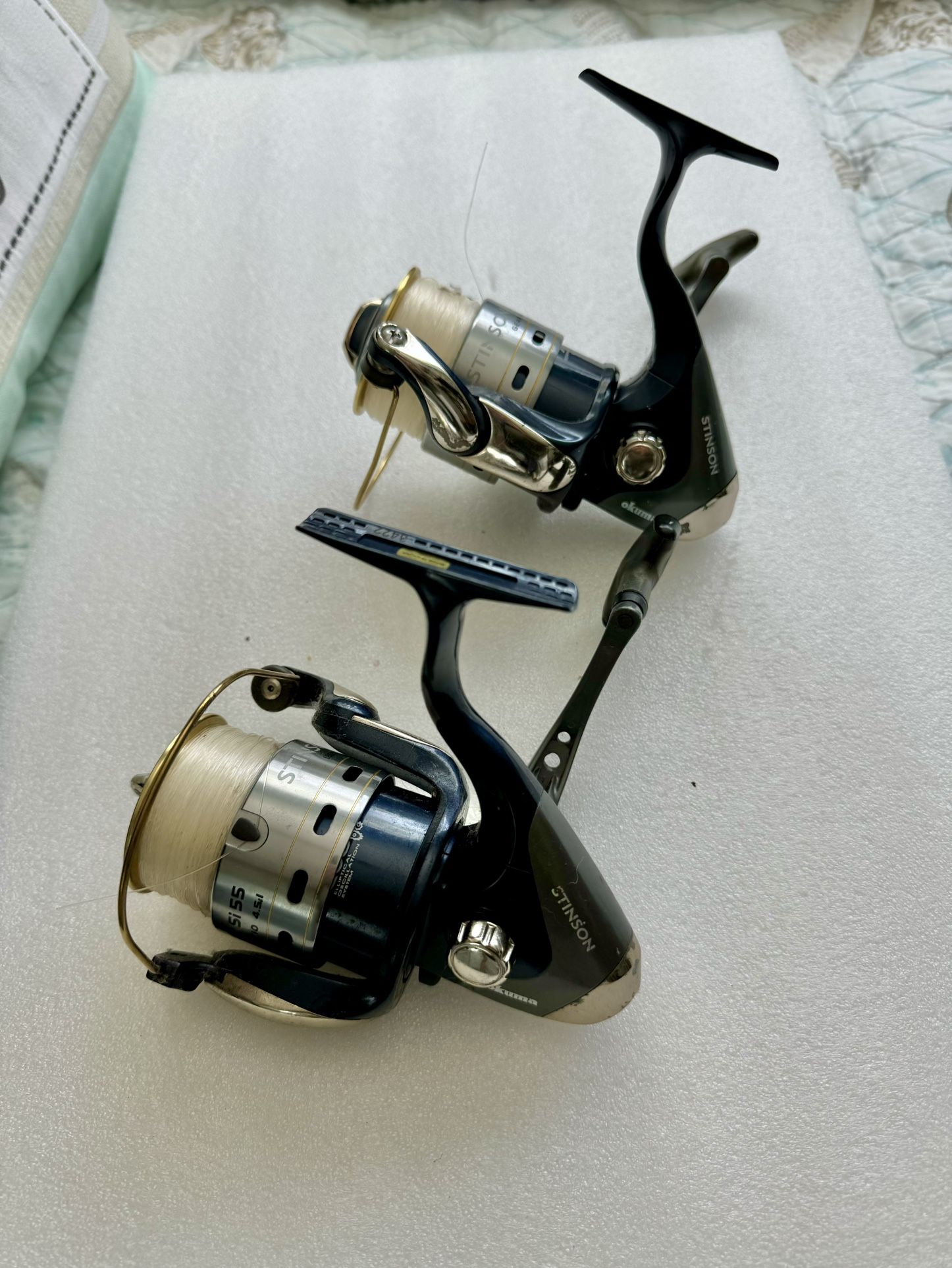 (2) Okuma Stinson SI 55 spinning reels fishing. price is for both