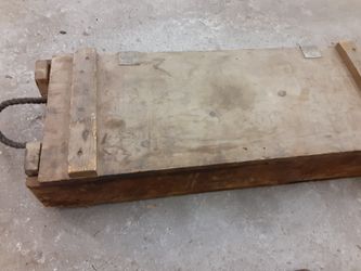 A OLD AMMUNITION BOX WITH 3 SAWS