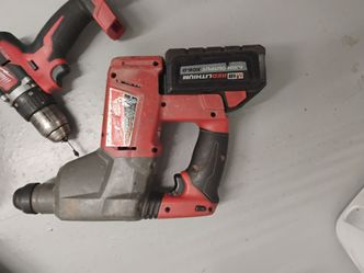 Milwaukee SDS Plus rotary hammer fuel brushless within M18 red lithium high output XC 6.0 battery