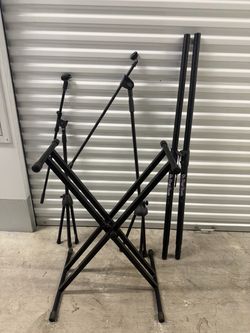 Dj equipment 1 piano stand 2 subwoofer speakers stand 2 mic stand firm on price