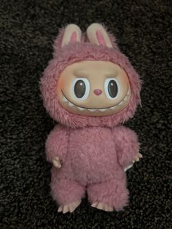 authentic pink labubu with clothes
