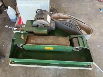 USED WORKING CODITION  Covington Commercial Horizontal Wet Belt Sander  Features  Heavy 16-gauge steel tank assures a long life Unobstructed access to