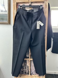 8S Express Editor pants in a super high rise, straight-leg style.