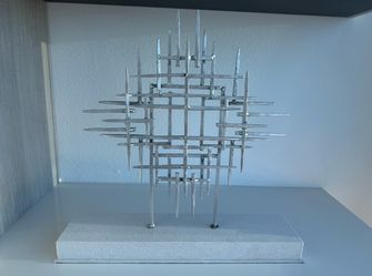 Brutalist style abstract metal sculptures