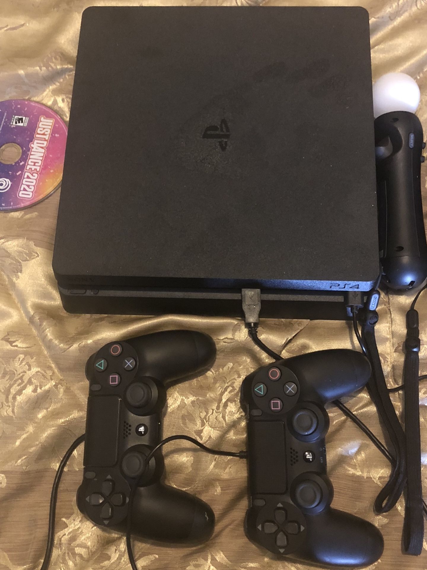 Play station 4 Black with controllers, motion wands and Just Dance 2020 disk with Fortnight